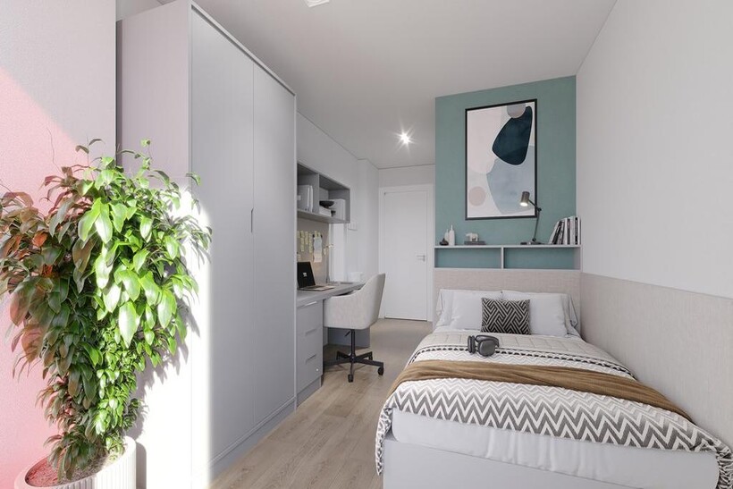 A bright and modern double bedroom featuring a ...