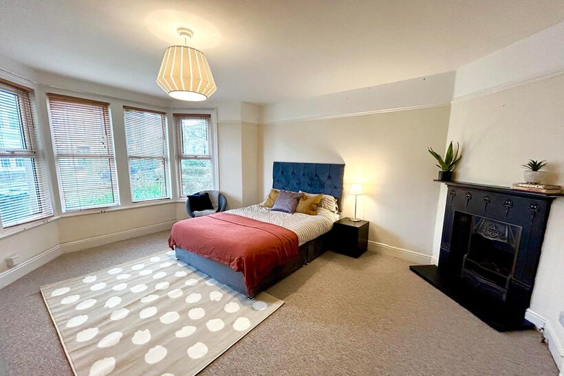 A beautifully presented double bedroom featurin...