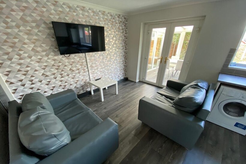 A cozy living room featuring modern furnishings...