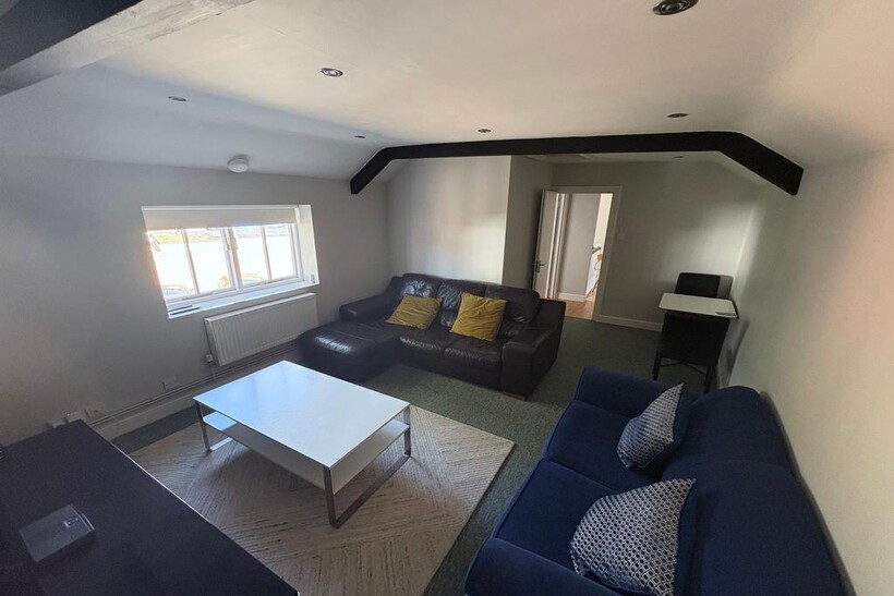 A cozy living room featuring two comfortable so...