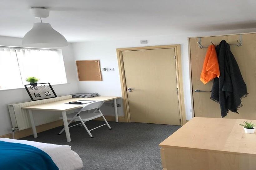 Bright and inviting double bedroom featuring a ...