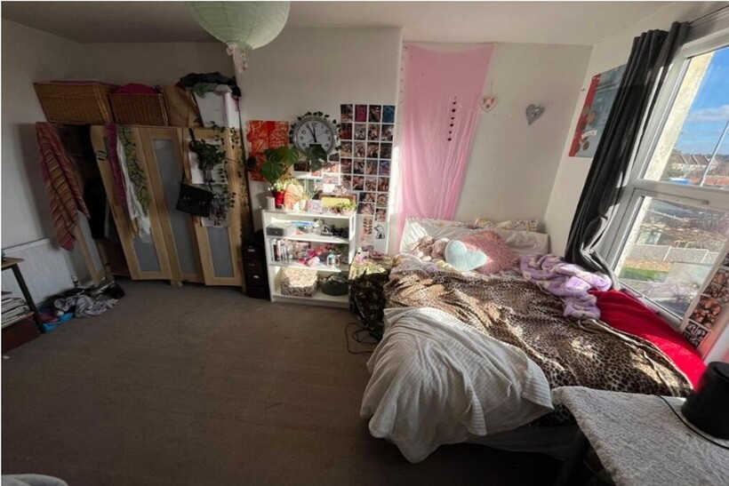 A cozy double bedroom filled with natural light...