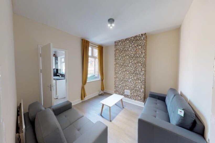 A bright and inviting living room featuring mod...