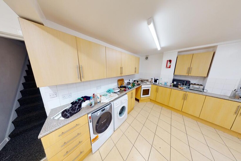 Bright and spacious kitchen featuring ample sto...