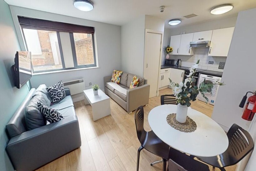 A modern and inviting living room featuring a c...