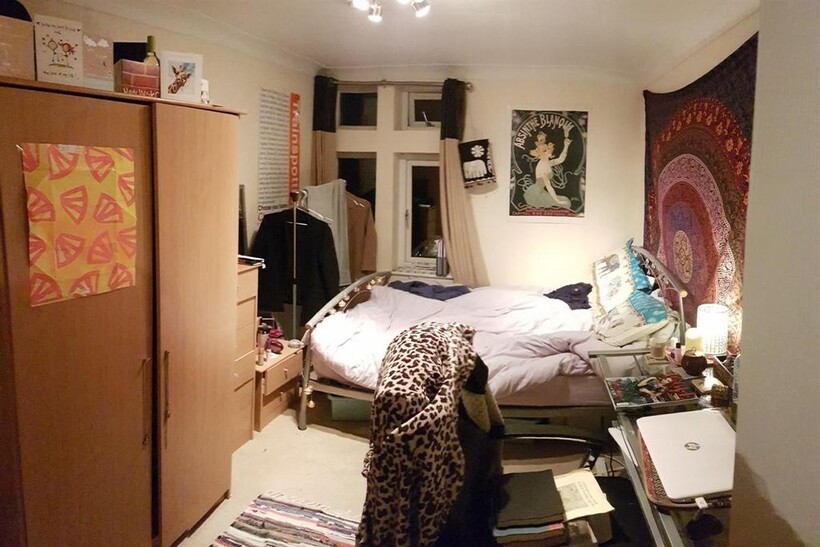 Cozy and personalized single bedroom featuring ...