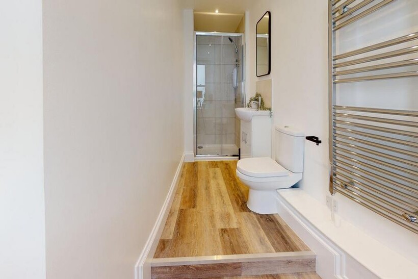 A modern and well-maintained bathroom featuring...