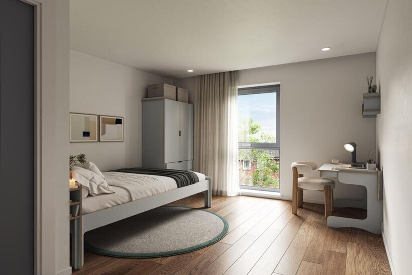 A stylish and well-lit double bedroom, perfect ...