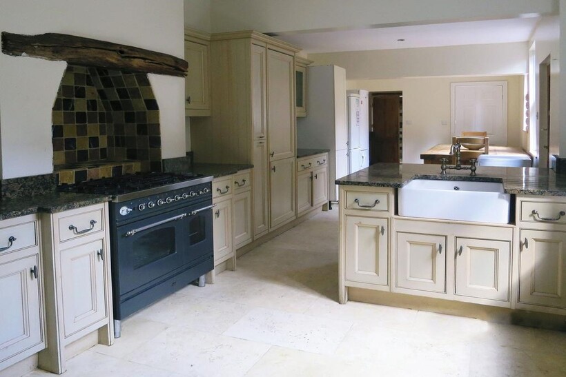 A spacious kitchen featuring traditional-style ...