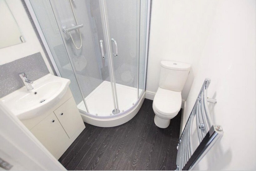 A modern and clean bathroom featuring a stylish...