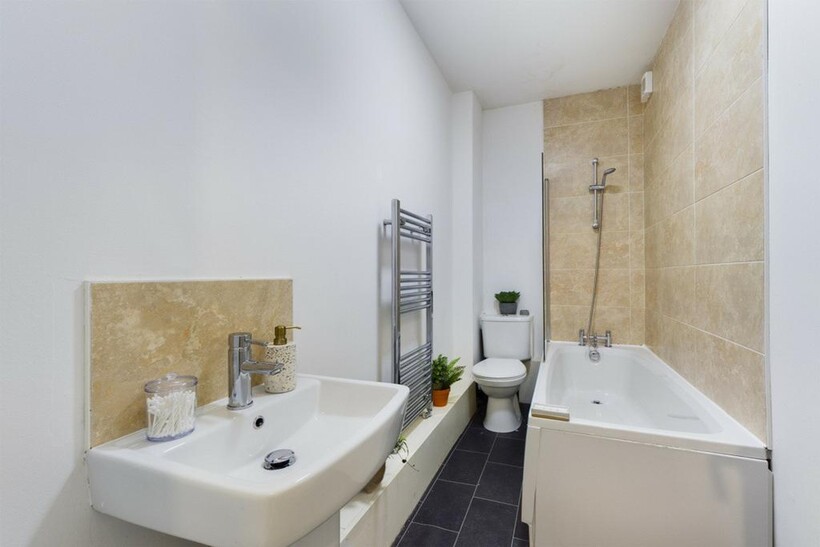 A modern and well-maintained bathroom featuring...