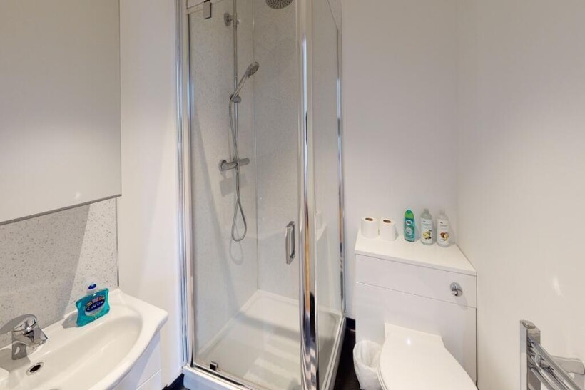 A modern and well-maintained bathroom featuring...