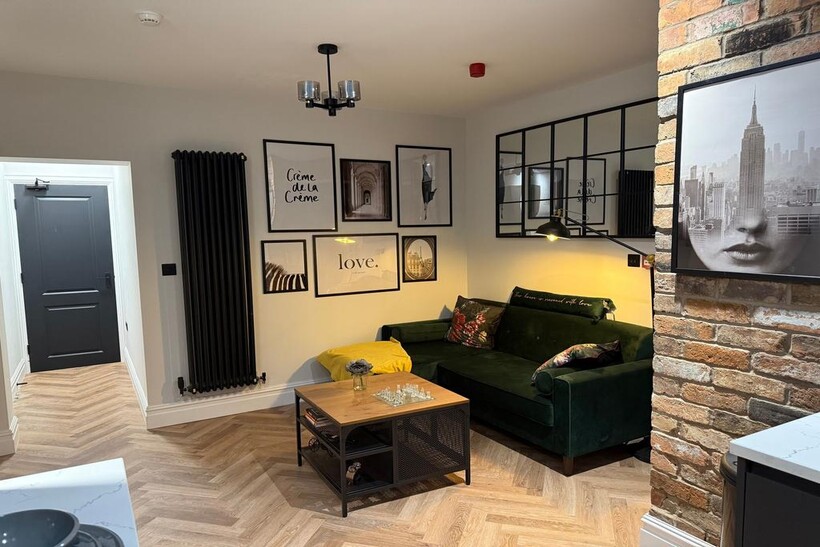 Stylish and cozy living room featuring modern d...