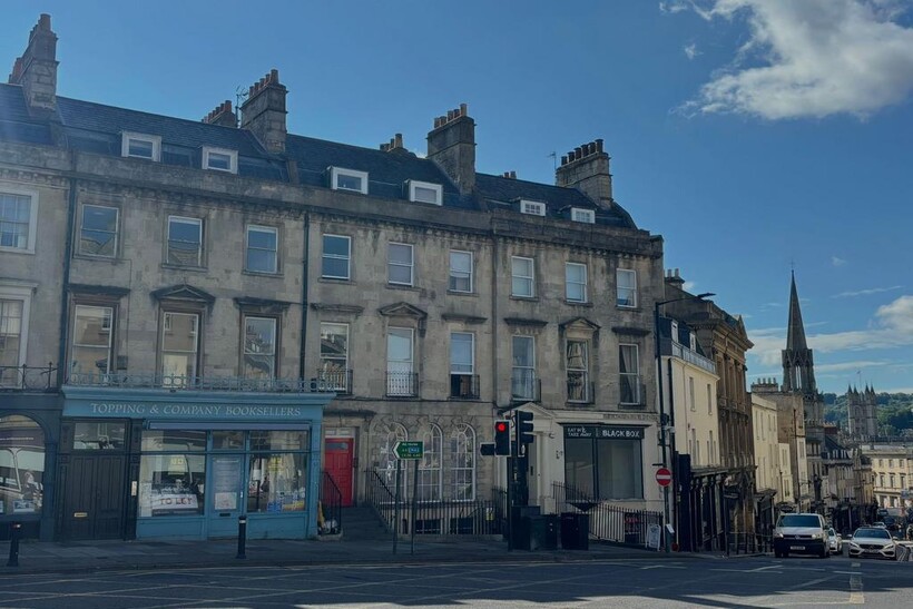A charming street view of a classic terraced bu...