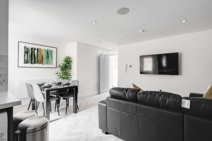 Modern and bright living room featuring contemp...