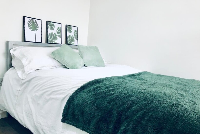 Bright and inviting master bedroom featuring a ...