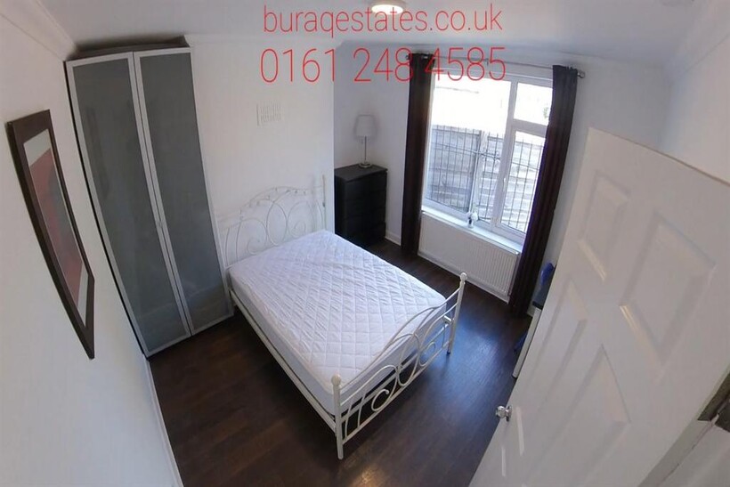 Bright and inviting master bedroom featuring a ...