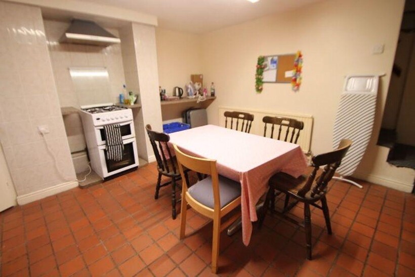 A bright and welcoming living area featuring a ...