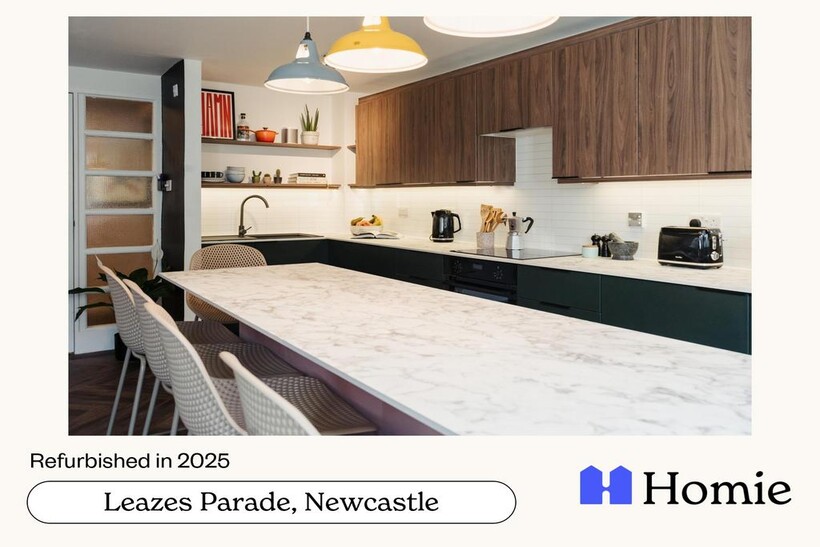 A modern and well-maintained kitchen with ample...