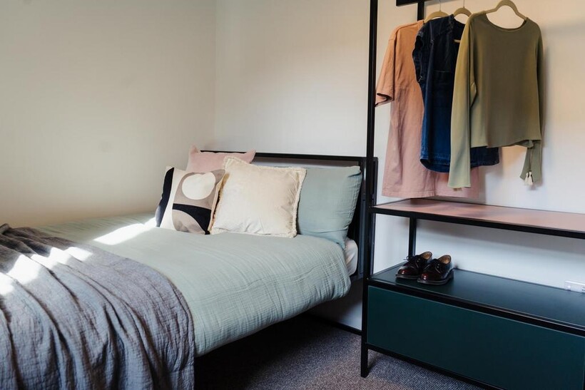 A spacious and well-maintained master bedroom f...