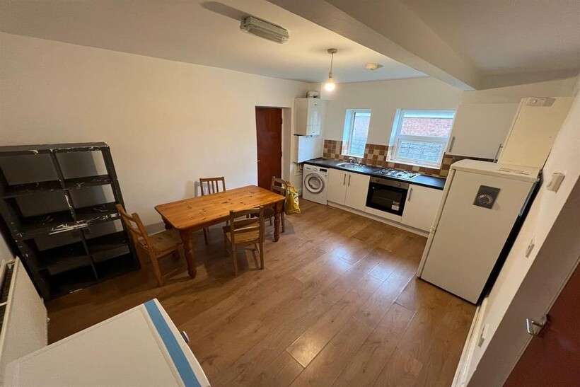 A bright and inviting living space with ample n...