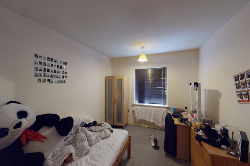 Bright and welcoming living room featuring a la...