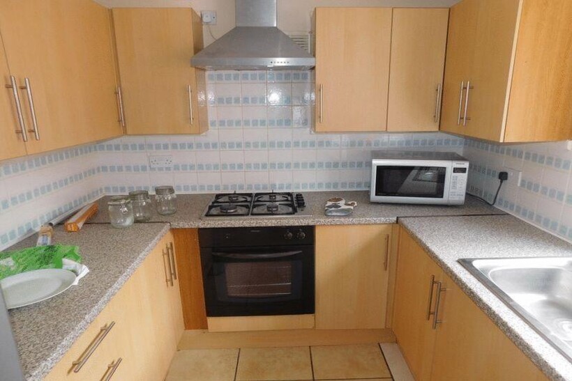 A well-maintained kitchen with modern appliance...