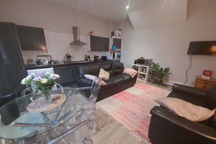 A welcoming living room with comfortable seatin...