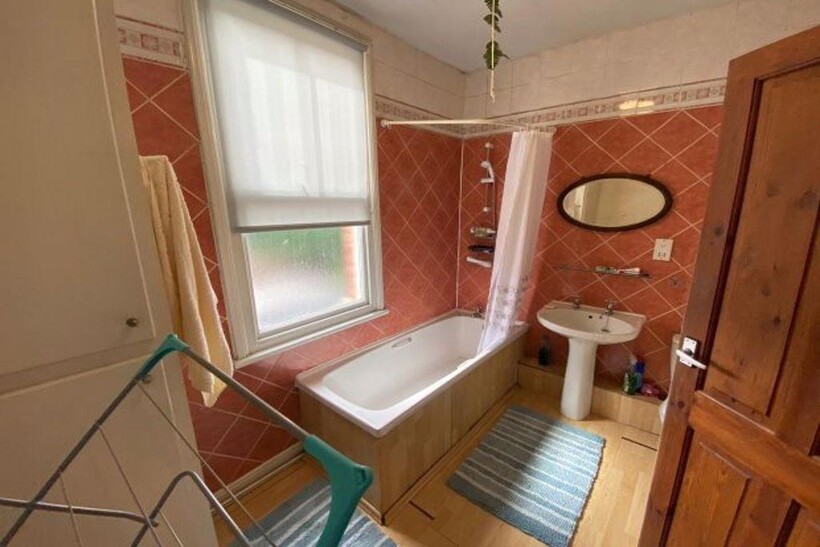 A clean and well-maintained bathroom featuring ...