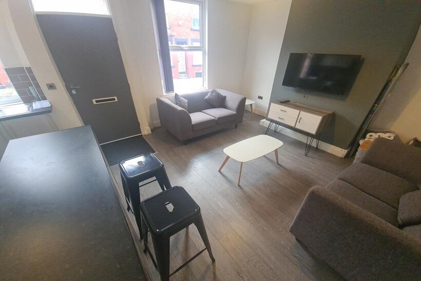 A modern and inviting living room with comforta...