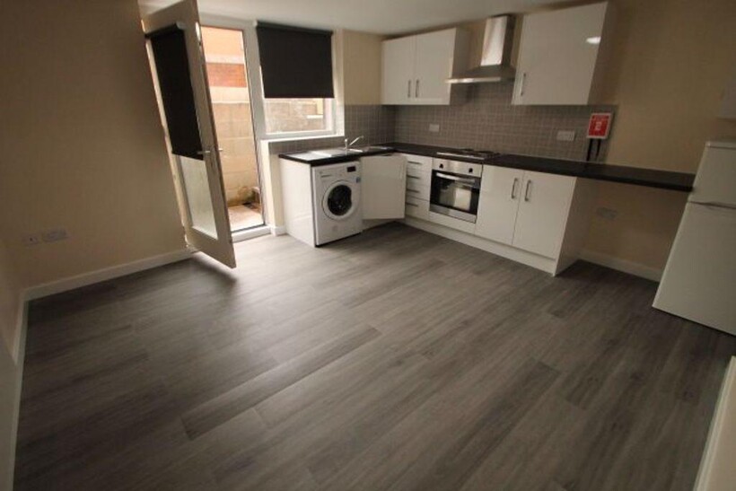 Modern kitchen with ample counter space, integr...