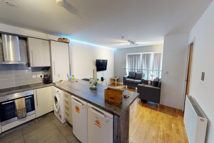 A spacious, modern living room featuring ample ...