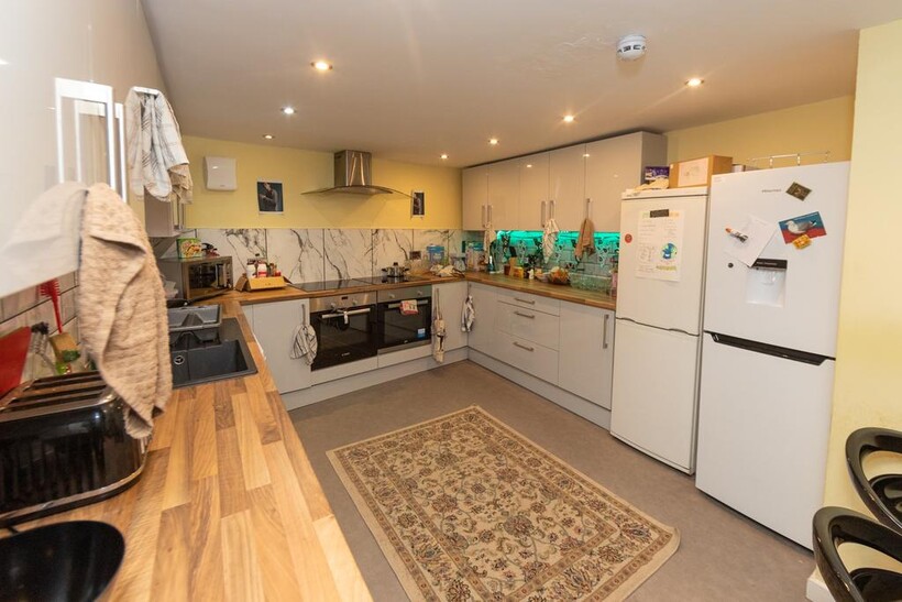 A modern and well-equipped kitchen featuring wh...