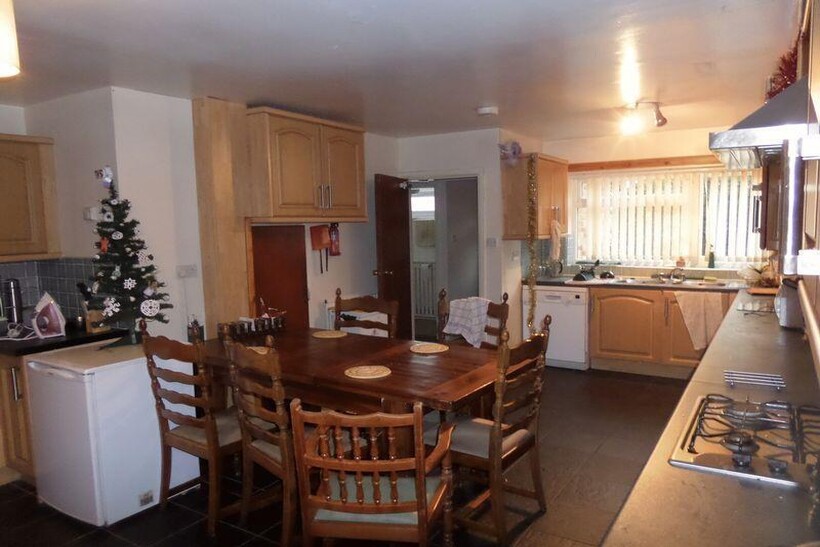 A bright and welcoming living room featuring a ...