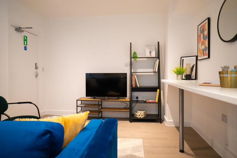 A bright and inviting living room with modern d...