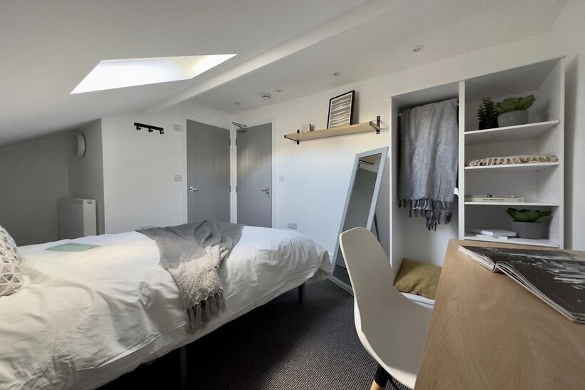 A spacious and inviting large double bedroom wi...