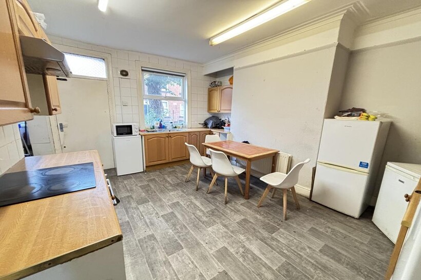 Bright and clean kitchen with ample natural lig...