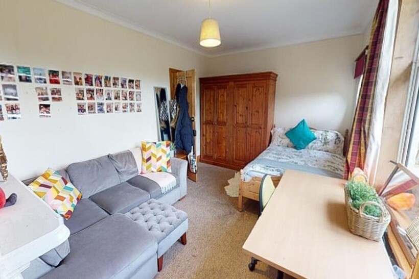 A bright and inviting living room featuring a l...