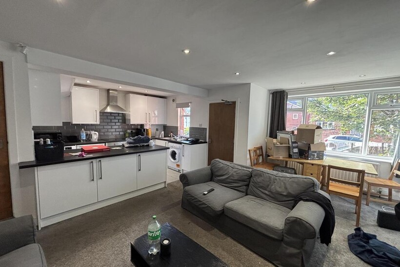 Bright and spacious living room with modern dec...