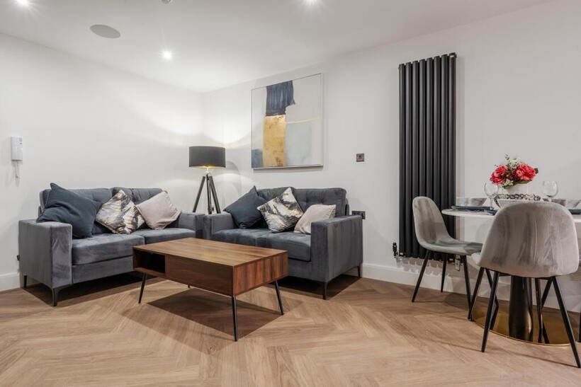 A spacious and well-maintained living room feat...