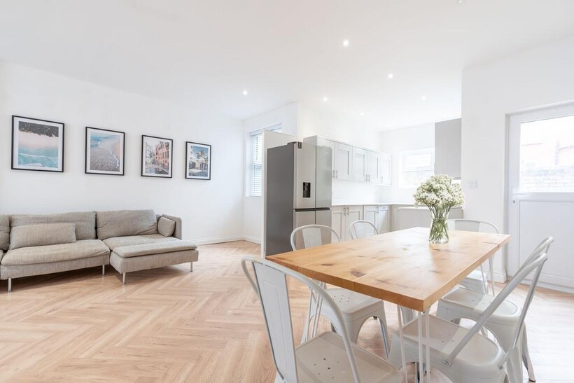 Bright, modern open-plan living and dining spac...