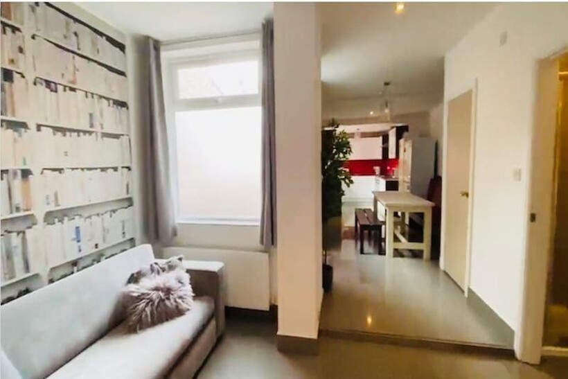 Bright, modern open-plan living space with a co...