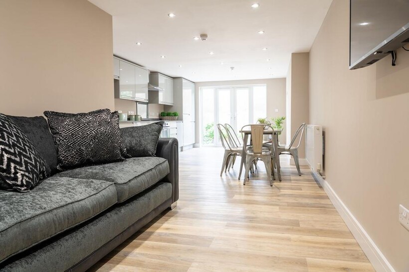 Contemporary open-plan living and dining area w...