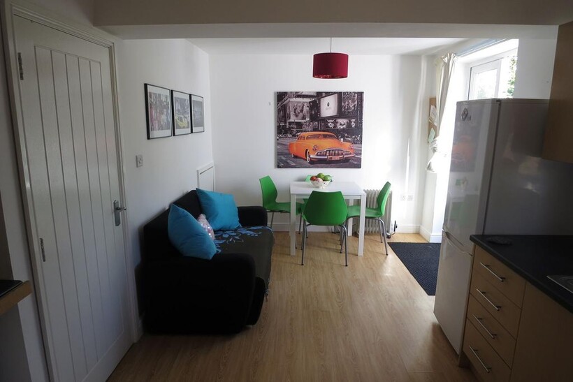 Bright, modern open-plan living area with a com...