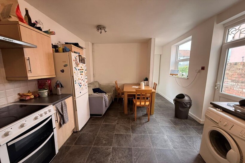 Bright open-plan kitchen/dining area with a fit...