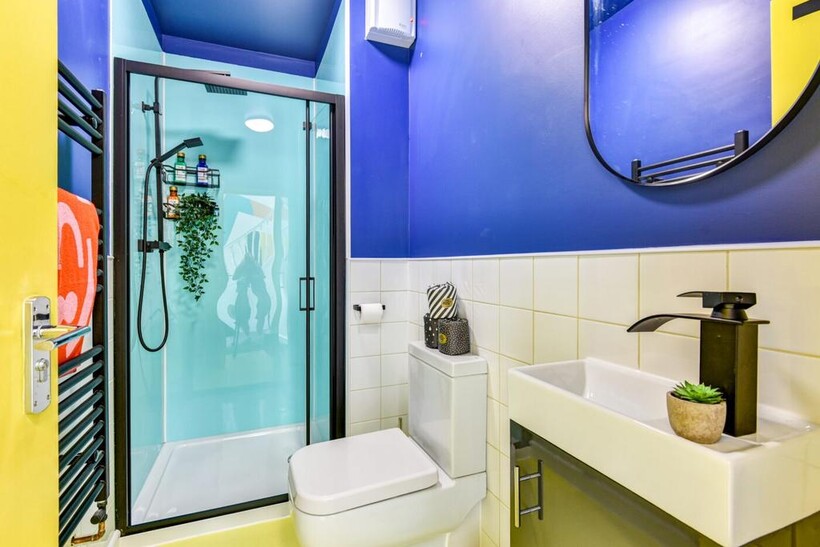 Bright and stylish bathroom featuring a modern ...