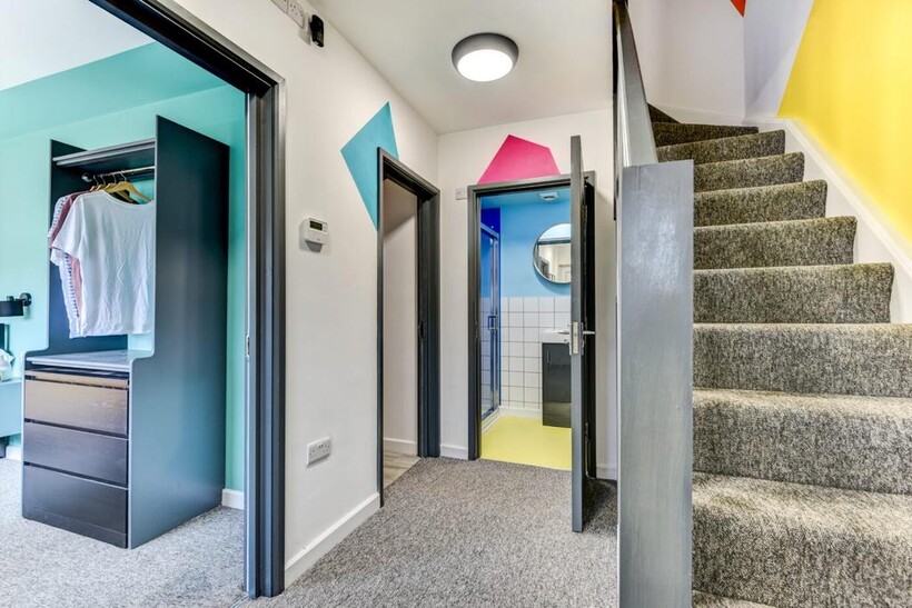 Bright, freshly decorated communal hallway with...