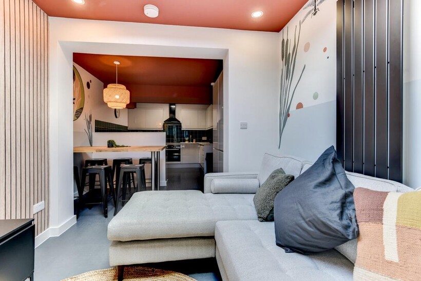 Stylish open-plan living area with a comfortabl...