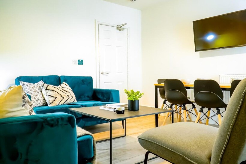 A spacious and stylish modern living room, perf...