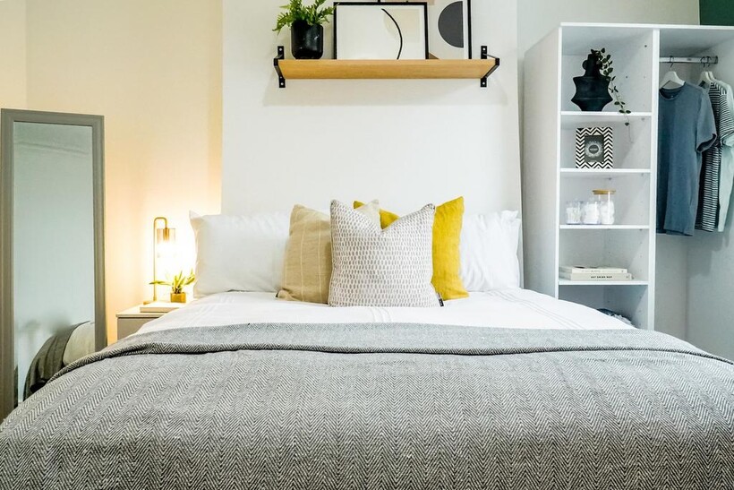 A bright and inviting double bedroom featuring ...